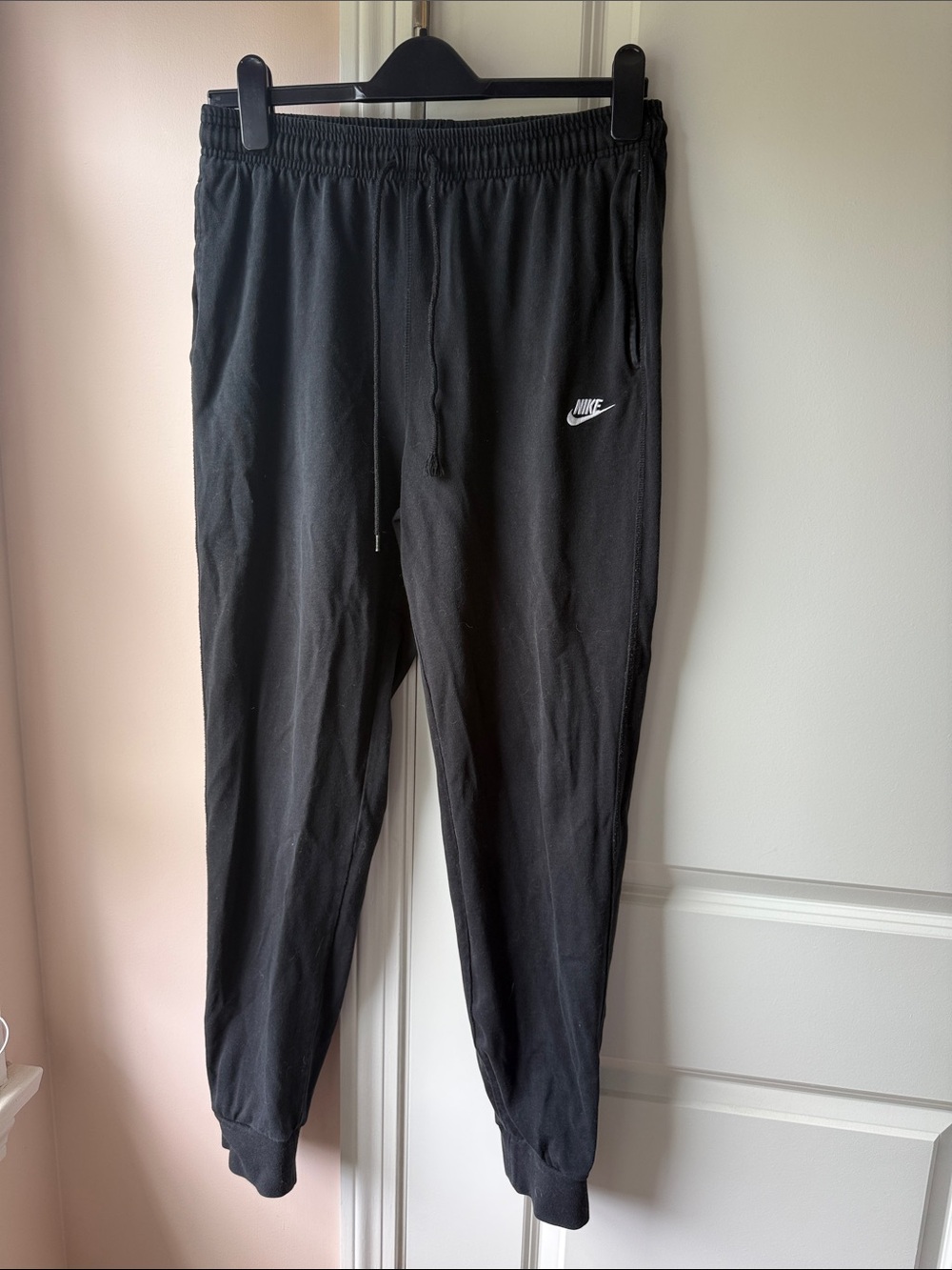 Nike Men's Black Jogger Sweatpants with White Swoosh